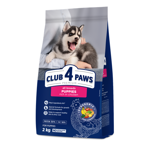 CLUB 4 PAWS PREMIUM DLA SZCZENIĄT WSZYSTKICH RAS "O WYSOKIEJ ZAWARTOŚCI KURCZAKA". PEŁNOPORCJOWA SUCHA KARMA